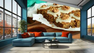 Gluten free carrot quinoa square cake bites topped with sugar glaze and walnut Wall mural