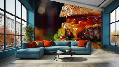 Close up of a juicy cheeseburger on a wooden board. Wall mural