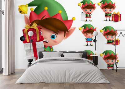 Christmas elf vector character set. Boy elves with green costume holding gifts and playing isolated in white background. Vector illustration.
 Wall mural