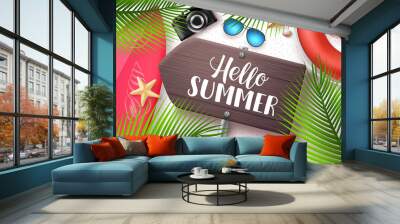 Hello summer vector banner. Wooden sign board with hello summer text and beach elements like surfboard and seashells in white sand background. Vector illustration. Wall mural