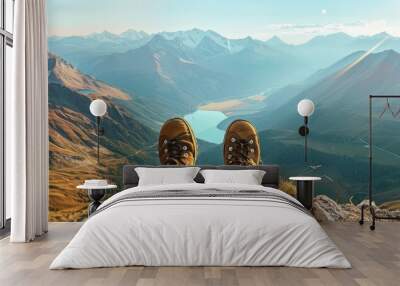 Mountain view from the top, two shoes in foreground Wall mural