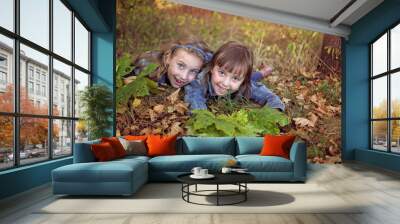 two friends laugh in the autumn day Wall mural