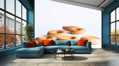 Delicious dried pastries or dry donuts lies on a table on a white background. Wall mural