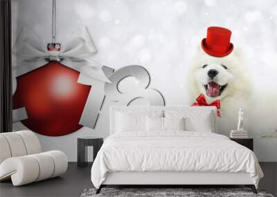 Text 2018 with Christmas ball and magic funny dog with red hat Wall mural