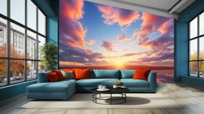 Beautiful orange and purple hues of the sky and clouds during sunset over the horizon Wall mural