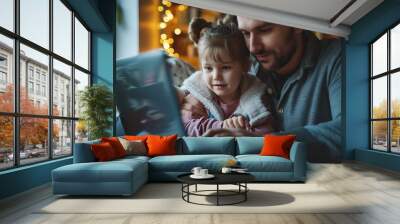 Father working from home on a laptop while caring for his young daughter, blending business and family life during quarantine, representing the freelancer lifestyle and remote work in a modern home Wall mural