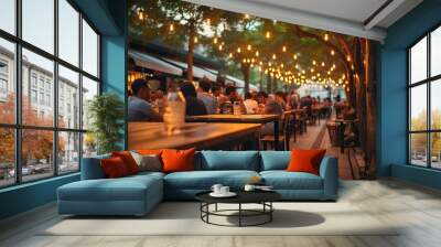 People enjoying music and beer at an outdoor street bar in Asia, bokeh effect Wall mural