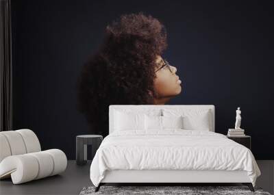 Portrait of teenage girl looking up Wall mural