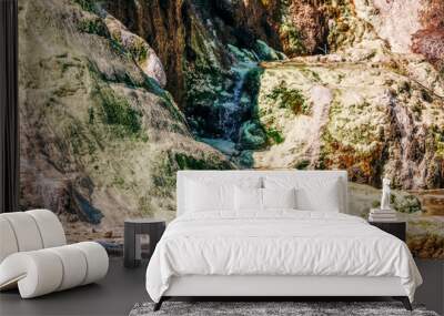 Rocky cliffs in volcanic landscape of Wai-O-Tapu Wall mural