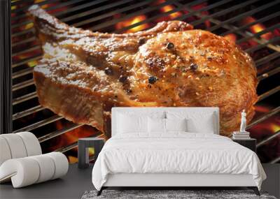 grilled pork chop on flaming grill. Wall mural