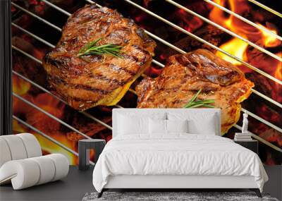 Grilled pork steaks on the flaming grill Wall mural