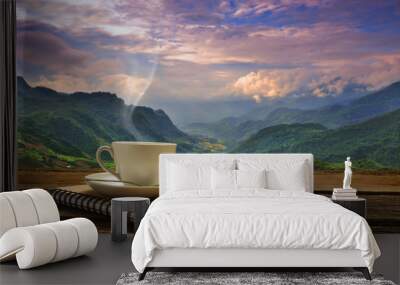 morning cup of coffee with mountain background at sunrise Wall mural