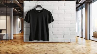 A stylish versatile black tshirt showcased elegantly on a hanger, making it ideal for everyday casual wear Wall mural