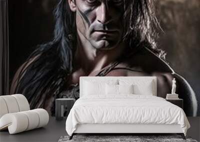 An image of a muscular fantasy barbarian wearing torn leather, scarred and scratched, and sporting long black hair contrasts with a cave ceiling. Wall mural