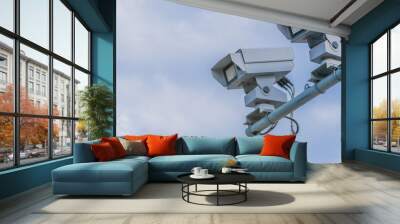 Speed radar cameras against blue sky Wall mural