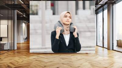 young executive businesswoman in black suit standing with confident face expression Wall mural