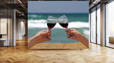 two glasses of wine on the beach Wall mural