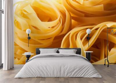 Italian egg pasta nest close-up. Fettuccine background Wall mural