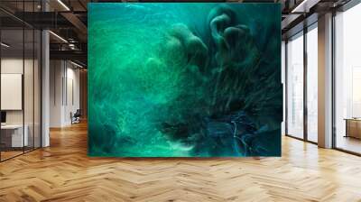 Liquid fluid art abstract background. Blue green acrylic paint underwater, galactic smoke ocean Wall mural