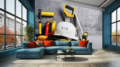 set of construction tools on a black wall background Wall mural