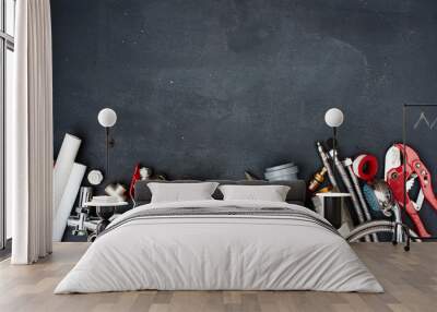 Top view of the plumbing equipment on a black background Wall mural