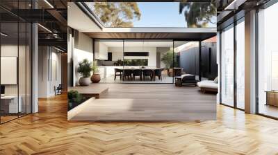 A deck, patio, and courtyard area have been added as part of the refurbishment of a contemporary Melbourne home expansion. Wall mural