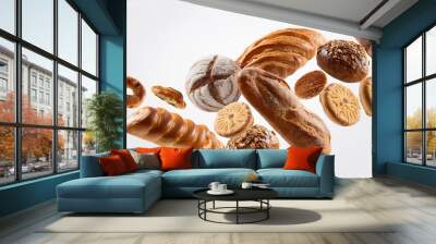 dynamic composition of assorted bakery products suspended in midair cookies pastries and bread loaves frozen in motion against white background gravitydefying food photography concept Wall mural