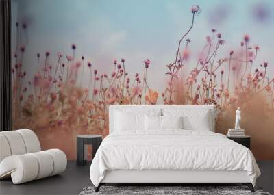 Flower field, meadow flowers in soft warm light. Autumn landscape blurry nature background. Wall mural