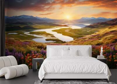 A panoramic view of a valley filled with colorful wildflowers and a meandering river Wall mural