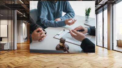 Business people and lawyers talk and contract together. Signing of a contract in the presence of an attorney. Wall mural