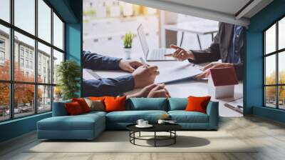 Signing a business contract. A group of business people meeting and signing an investment, buying and selling home and real estate agreement. Wall mural