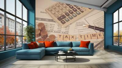 wording tax and calculator with tax documents and money on table. Tax concept. Wall mural