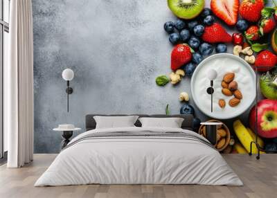 Top view of freshly baked bread and flour on a wooden background, room for copy in the middle Wall mural