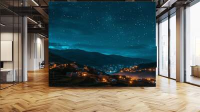 A serene night view of a countryside village with twinkling lights and a starry sky Wall mural