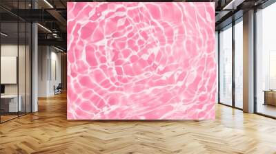 Abstract pink water surface. Closeup of clear calm water surface texture with ripples, splashes. Transparent shiny water waves with sunlight. Natural summer banner background with Copy space, top view Wall mural