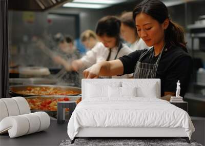 Female Chef Stirring Food in Wall mural