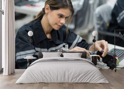 Female engineer training AI robot training kit and mechatronics engineering in the manufacturing automation and robotics academy room Wall mural