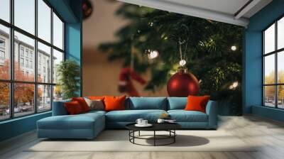 Decoration of a christmas tree with red ball Wall mural