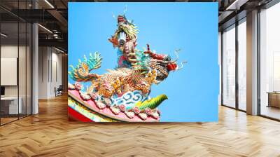 two dragon on roof with blue sky Wall mural