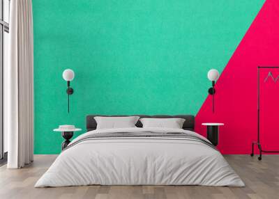 Green and red pastel papers geometric lay as background. Wall mural