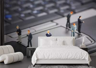 Businessmen on a laptop Wall mural