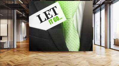 Let it go on card in businessman pocket. Life and work balance concept Wall mural