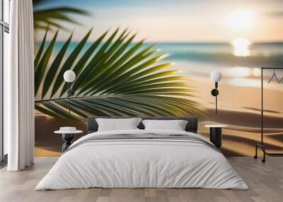 Palm leaves and sandy beach with blurred bokeh against the ocean. Layout of travel and tour offers. Wall mural