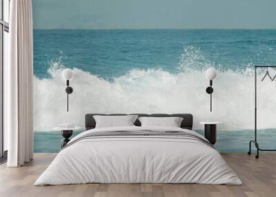 wave breaking on the beach Wall mural