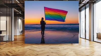 Intersex LGBT rights Silhouette of a person standing on a beach at sunrise Wall mural