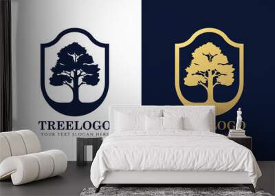 Gold and dark blue tree logo sign in Elegant shield frame vector design Wall mural