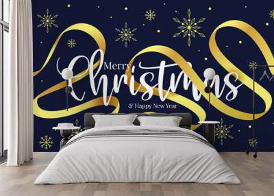 merry christmas and happy new year text with gold ribbon rolling around and gold snow texture on dark blue background vector design Wall mural