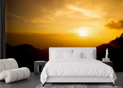 Orange Sunset shine on sky and mountain in evening time Wall mural