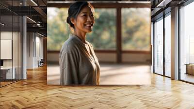 Active mature woman enjoying doing stretching, yoga or tai chi exercises, physical and mental health concept, wellness outdoors, showing joy and camaraderie, embodying a healthy, retired lifestyle Wall mural