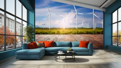 Empty table background of wind turbines on the horizon in a green rural landscape -Alternative renewable green energy
.clean energy day concept Wall mural